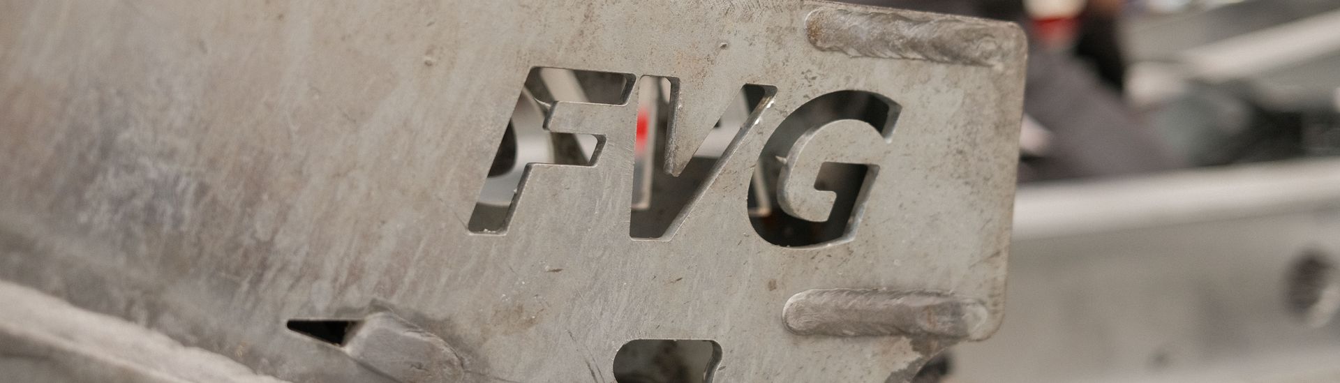 Metallstück mit Firmenstanzung