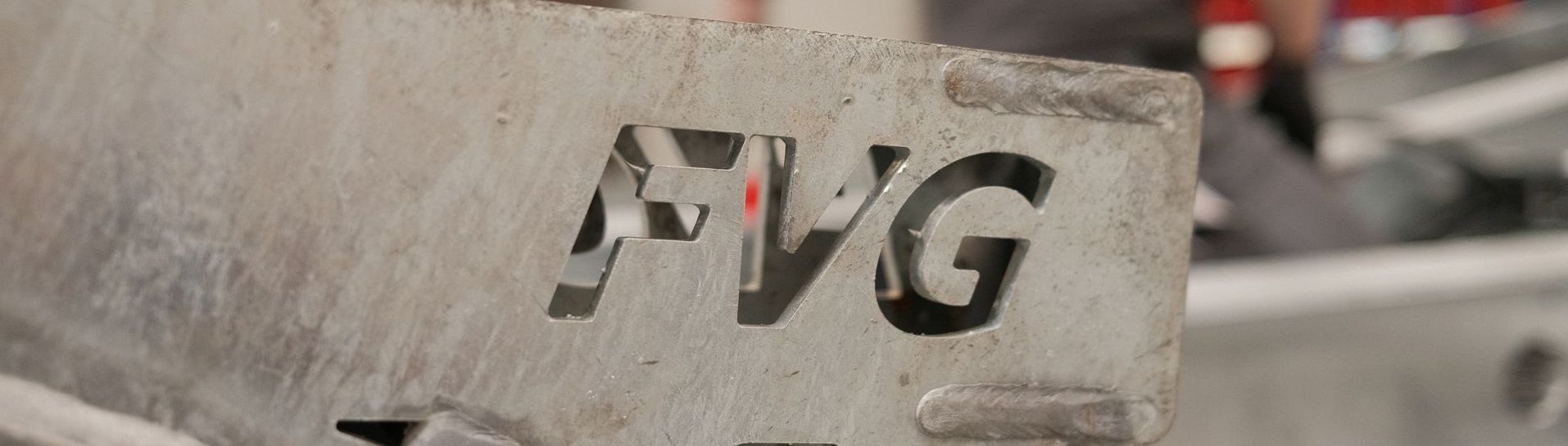 Metallstück mit Firmenstanzung